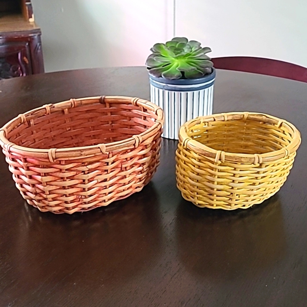 TWO great well made nesting baskets made in The Philippines tan and light yellow